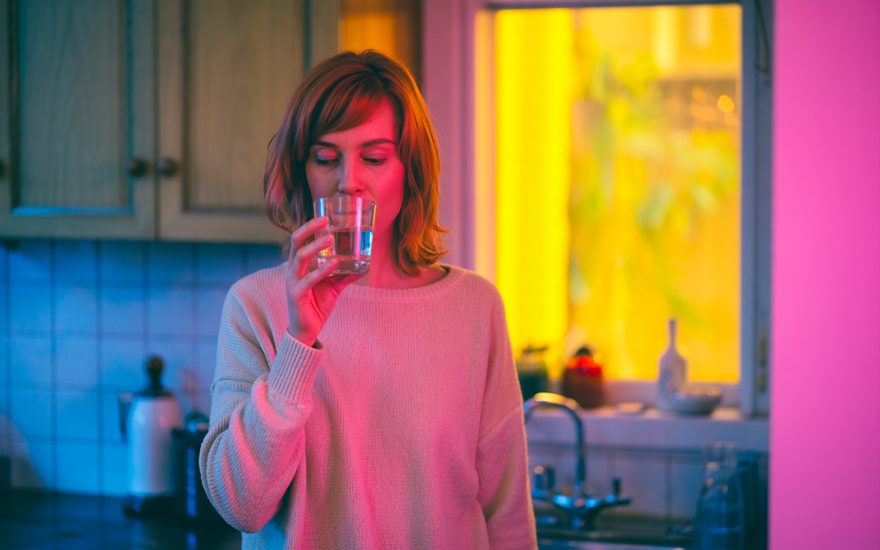 woman taking oral contraception